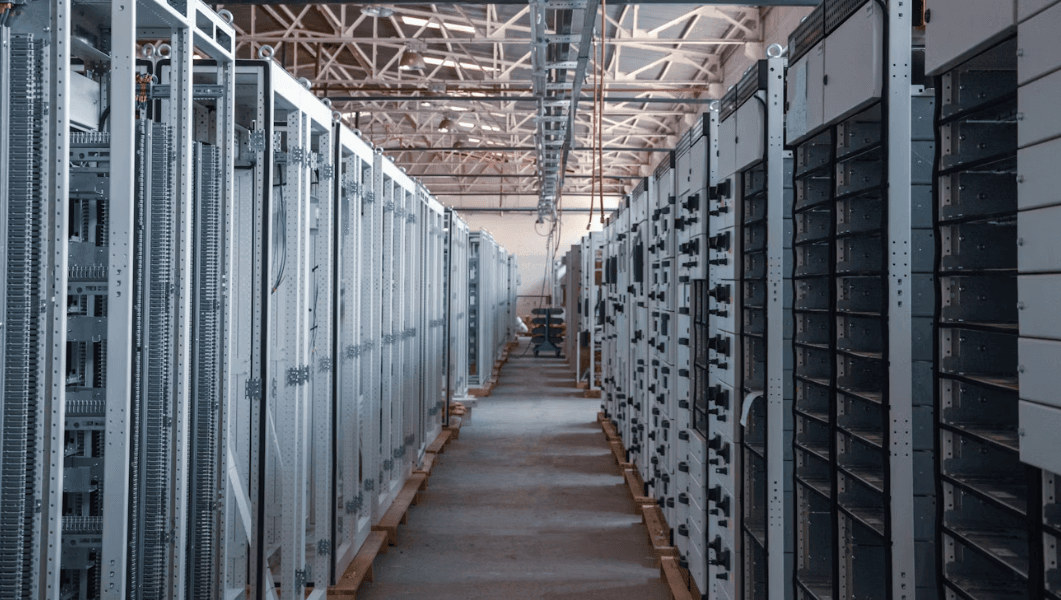 Rows of server cabinets in a modern data center